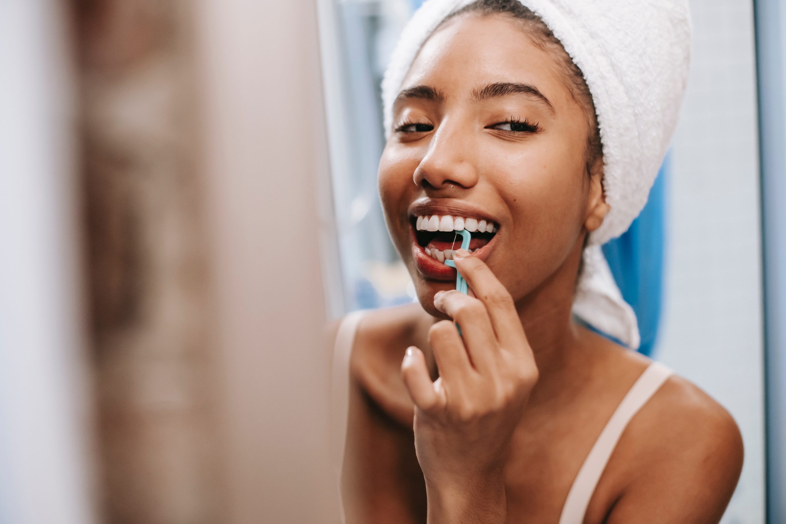 Why Flossing is Important and Why People Don't Do It, according to dentists